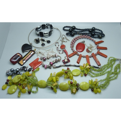 921 - A collection of stone set jewellery including silver mounted