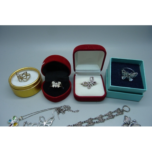 922 - A collection of silver butterfly jewellery, including four boxed rings