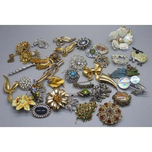 Forty brooches