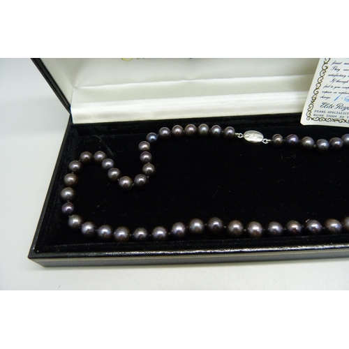 934 - An Elite Royal Tahiti coloured pearl necklace, boxed