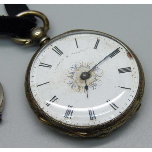 942 - A silver fob watch, dial a/f, three silver rings including one set with diamonds and a costume ring