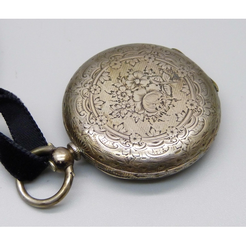 942 - A silver fob watch, dial a/f, three silver rings including one set with diamonds and a costume ring