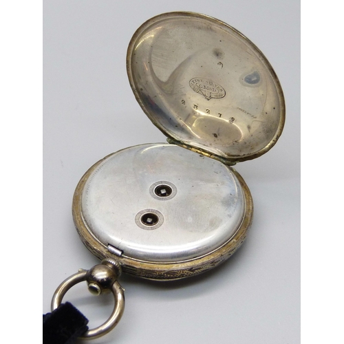 942 - A silver fob watch, dial a/f, three silver rings including one set with diamonds and a costume ring