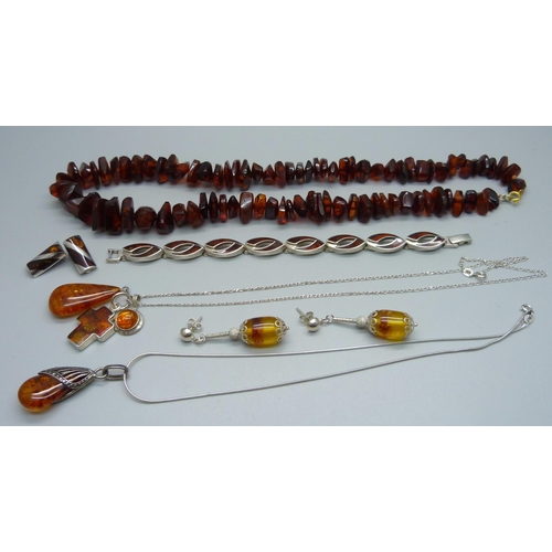 944 - Silver mounted amber jewellery and an amber necklace