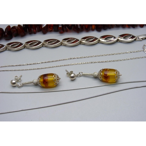 944 - Silver mounted amber jewellery and an amber necklace