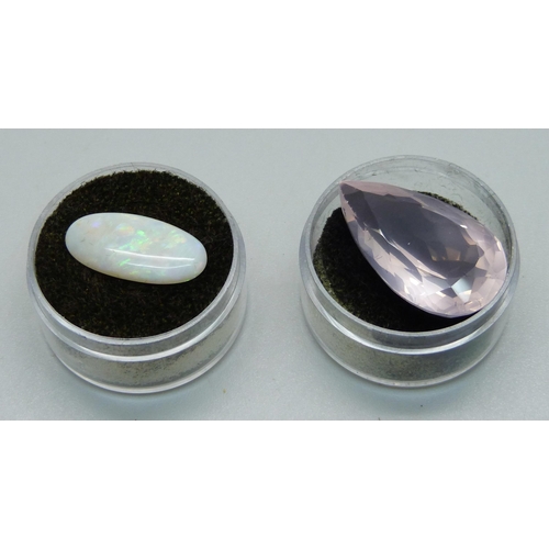 956 - An unmounted opal and rose quartz, opal 0.9g and 19mm