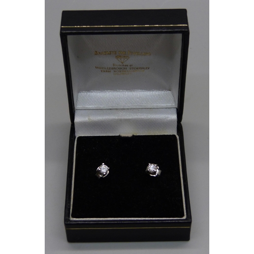 958 - A diamond stud earrings, approximately 0.50ct diamond weight