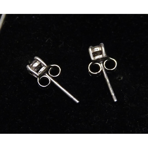 958 - A diamond stud earrings, approximately 0.50ct diamond weight