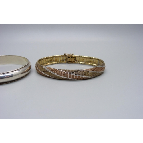 962 - An Italian silver gilt bracelet and a silver bangle, 32g