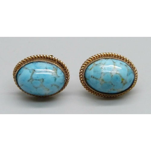 967 - A pair of 9ct gold and cabochon stone screw back earrings