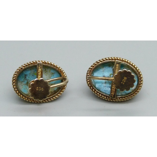 967 - A pair of 9ct gold and cabochon stone screw back earrings