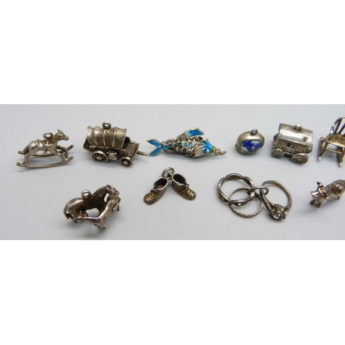 984 - Seventeen silver and white metal charms including enamelled and one by Chim, 47g