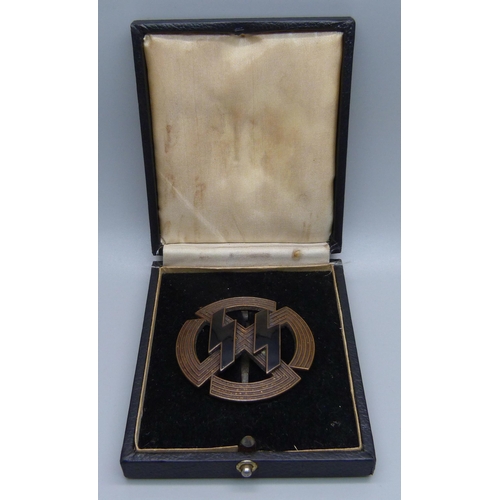 989 - A German Proficiency SS runes badge, (bronze award sports), cased