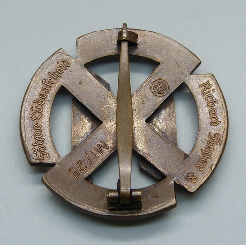 989 - A German Proficiency SS runes badge, (bronze award sports), cased