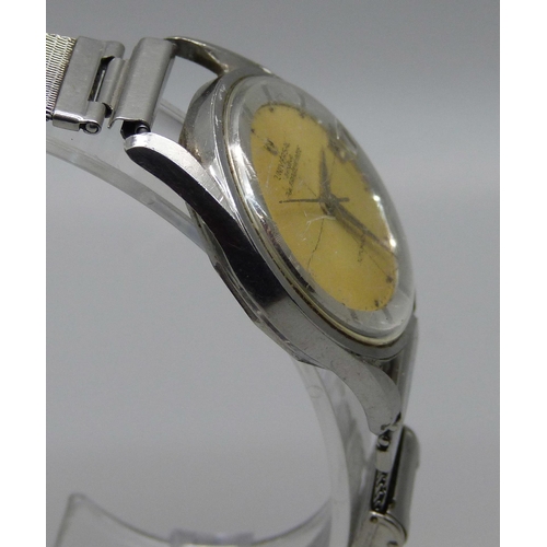 999 - A gentleman's vintage Universal Polerouter Date automatic wristwatch, 32mm case