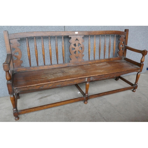 206 - An early 20th Century oak and elm bench