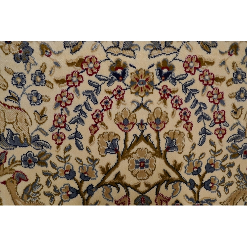 1447 - An ivory ground Cashmere carpet, traditional tree of life design, 200cm x 300cm