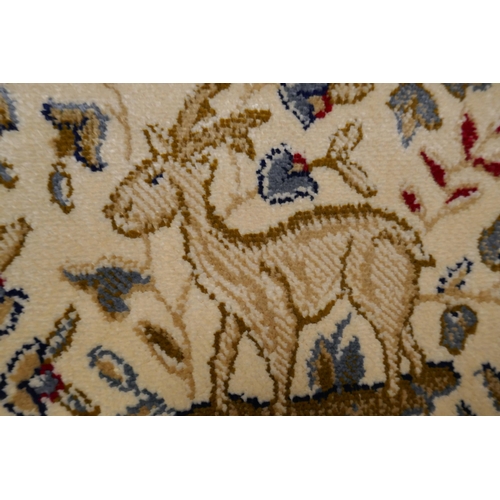 1447 - An ivory ground Cashmere carpet, traditional tree of life design, 200cm x 300cm