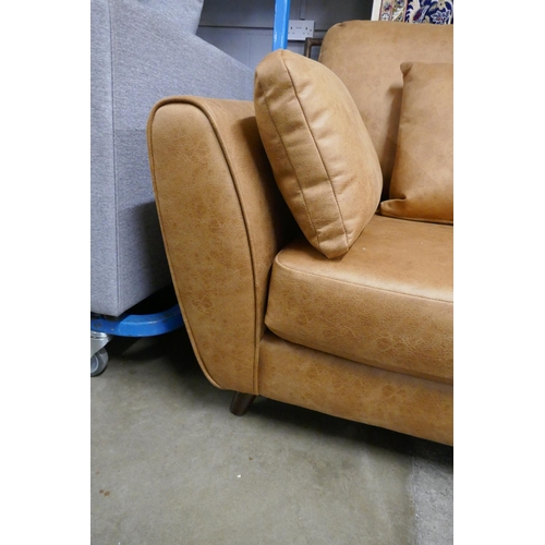 1448 - A Vegan leather three seater sofa