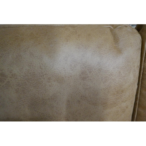 1448 - A Vegan leather three seater sofa