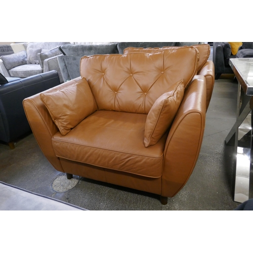 1462 - A tan leather Hoxton love seat, RRP £1539