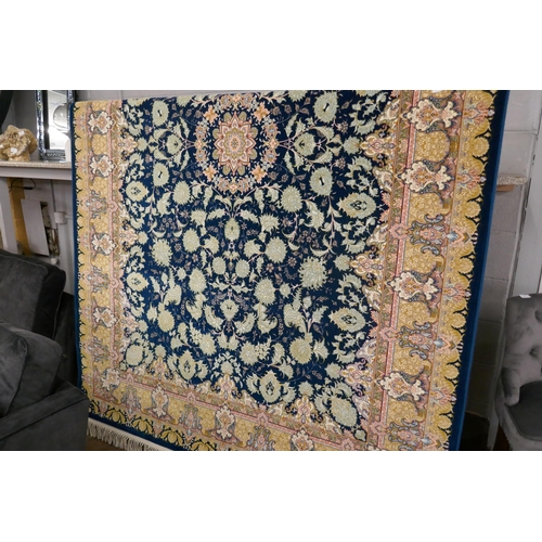 1519 - A fine woven Iranian carpet, floral embossed pattern with hints of duck egg blue, 300cm x 200cm