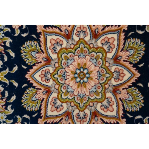 1519 - A fine woven Iranian carpet, floral embossed pattern with hints of duck egg blue, 300cm x 200cm