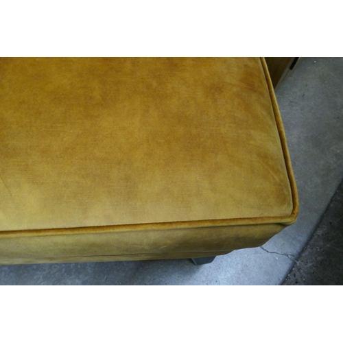 1528 - A turmeric velvet footstool RRP £459