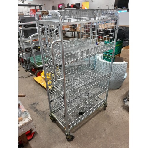 2247 - A stainless steel 4 wheeled, 5 tiered catering trolley