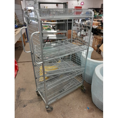 2248 - A stainless steel 4 wheeled, 5 tiered catering trolley