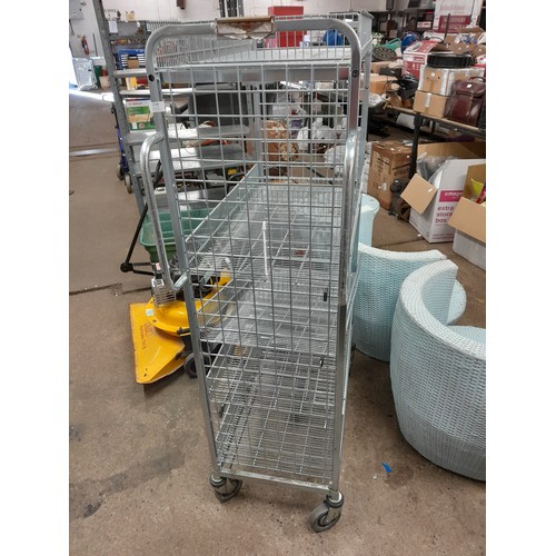 2248 - A stainless steel 4 wheeled, 5 tiered catering trolley