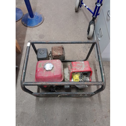 2253 - A Honda EC2200K2 2.2kva generator with a Honda GX160 5.5hp petrol engine