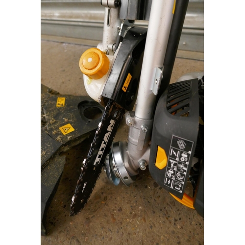 2215 - A petrol driven Titan TT5MTP26-2 multi tool with multiple attachments including hedge cutter, chains... 