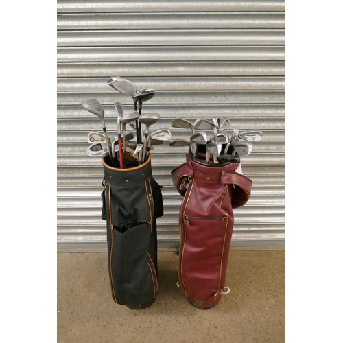 2267 - Two golf bags with various golf clubs of various brands