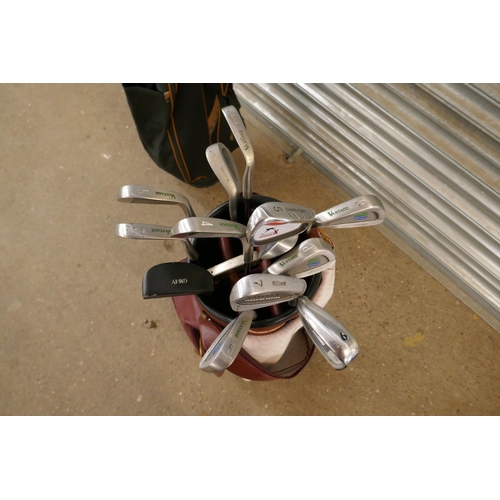 2267 - Two golf bags with various golf clubs of various brands