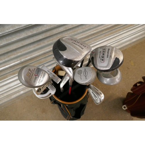 2267 - Two golf bags with various golf clubs of various brands