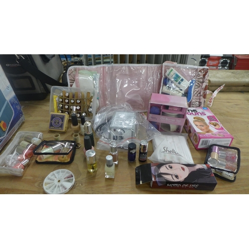 2319 - Two boxes of various makeup items including nail paint, press on nails, hair pins, etc.