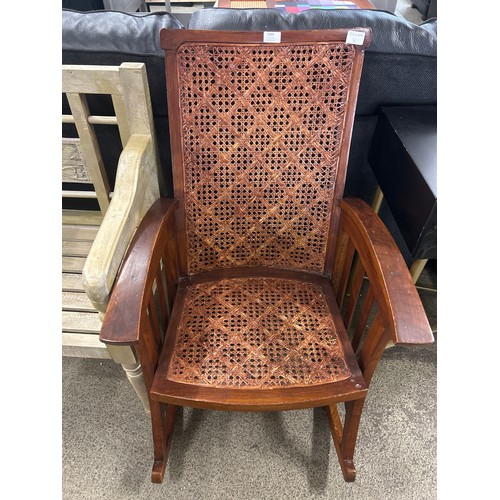 1599 - A gold painted bench and a stained wood rocking chair