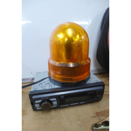 2413 - A container of car accessories; bluetooth radio - W, tow bar, tow rope, yellow flashing beacon, thre... 