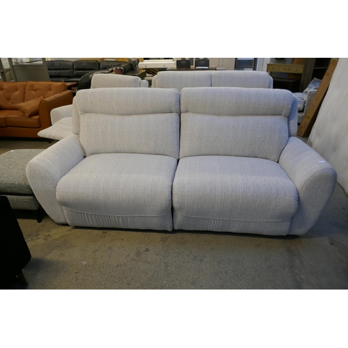 1579 - A grey weave electric reclining three seater sofa