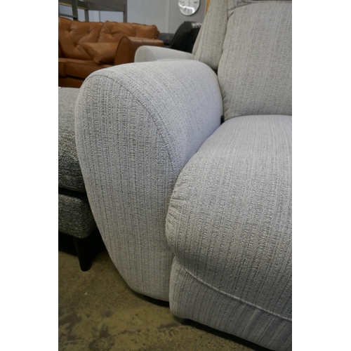 1579 - A grey weave electric reclining three seater sofa