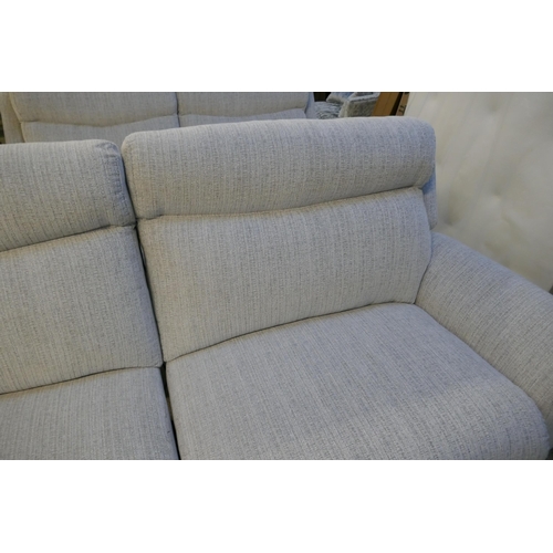 1579 - A grey weave electric reclining three seater sofa