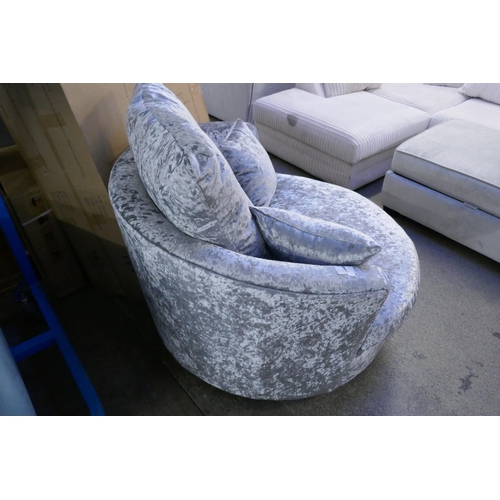 1595 - A silver velvet swivel armchair