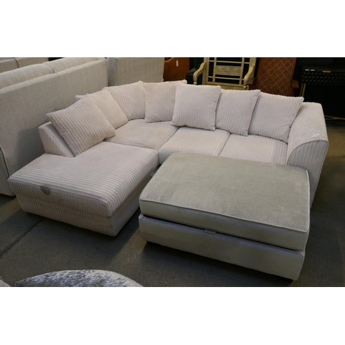 1596 - A white jumbo cord corner sofa and ottoman footstool (damaged)