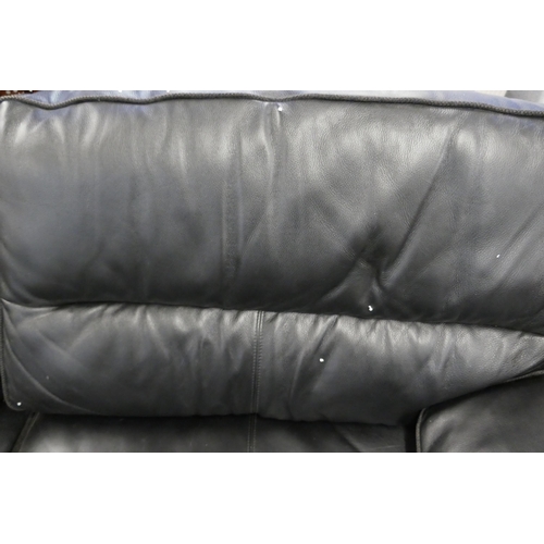 1600 - A black upholstered and leather large corner sofa