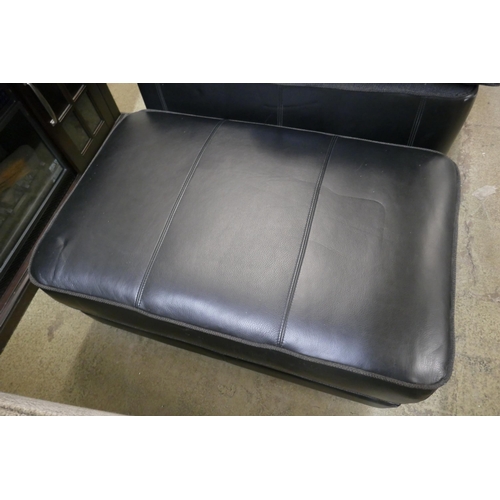 1600 - A black upholstered and leather large corner sofa