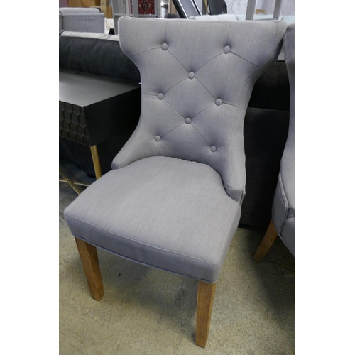 1620 - A pair of grey upholstered dining chairs