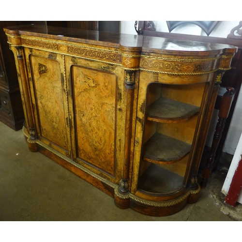 104 - A Victorian inlaid figured walnut and ormolu mounted credenza (lacking glass to doors)