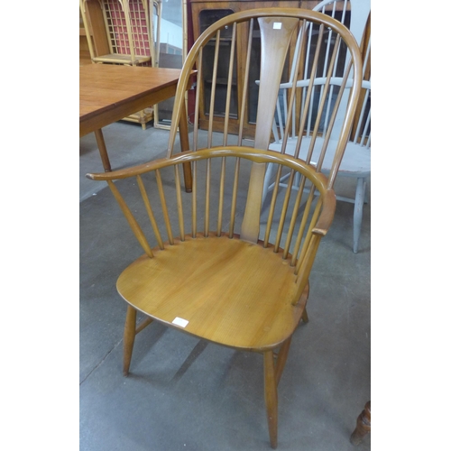 115 - An Ercol Goden Dawn elm and beech Chairmaker's chair