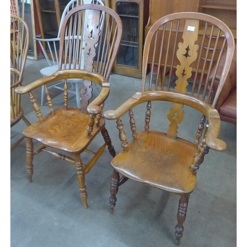 116 - A pair of 19th Century elm and beech Windsor highback armchairs